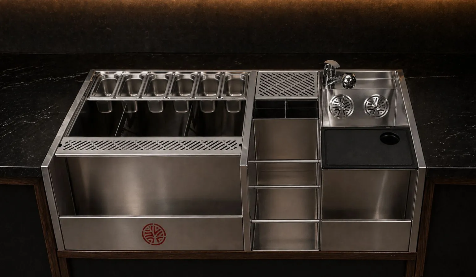 Compact 52-inch stainless steel bar station in a dark bar setting, ideal as a coffee bar counter