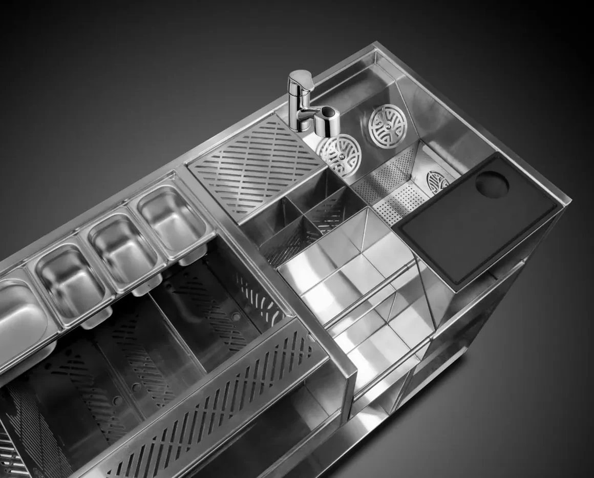Integrated stainless steel rinse sink on a Kobayashi bar station