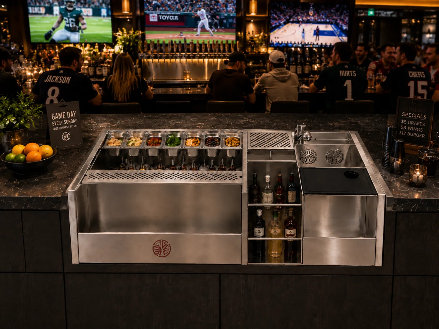 Sports bar design with a stainless steel Kobayashi station, game-day TVs, and jerseys