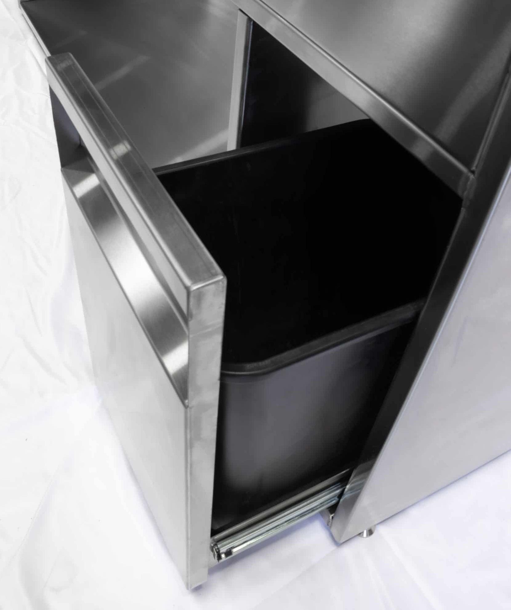 Pull-out waste drawer on stainless steel commercial bar station