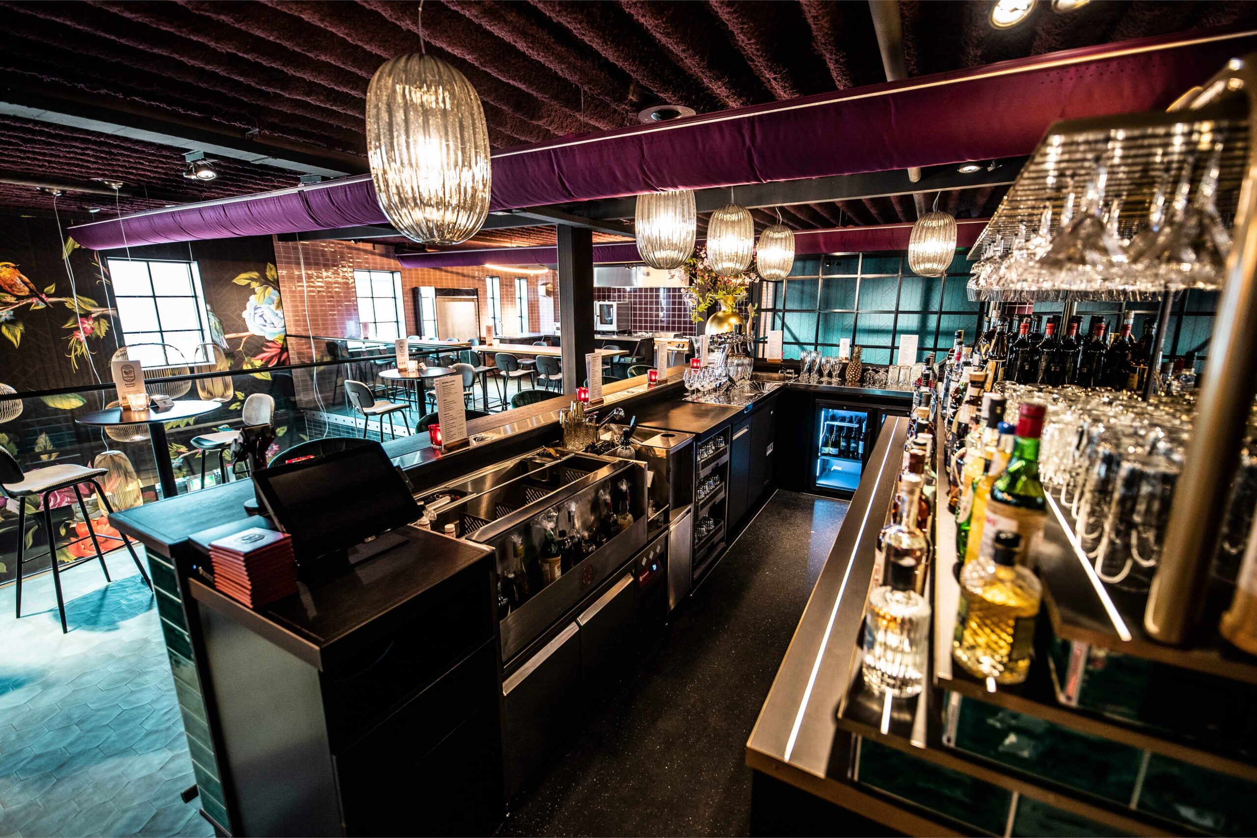 Restaurant bar design with integrated Kobayashi stainless steel cocktail station and drink rail